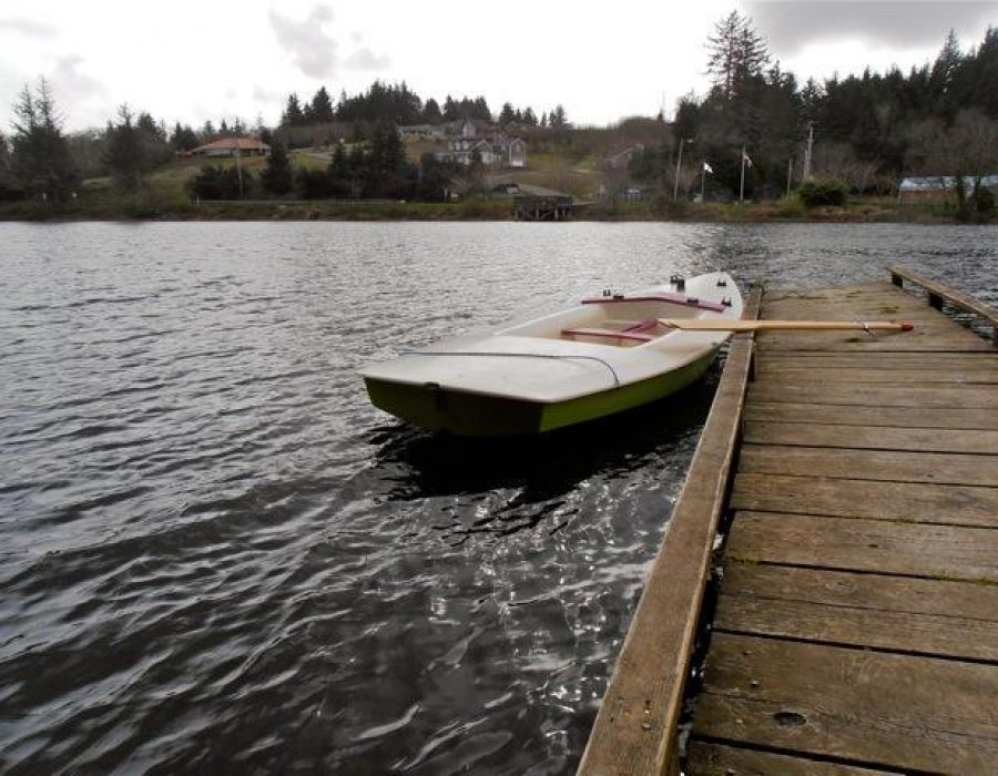 An image of a private kayak at a local dock. The colors of the picture give it a tranquil and peaceful feeling.