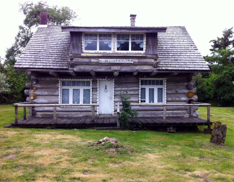 An image of 'The Wreckage', a house constructed entirely from from salvaged materials from shipwrecks along the coast in 1912.