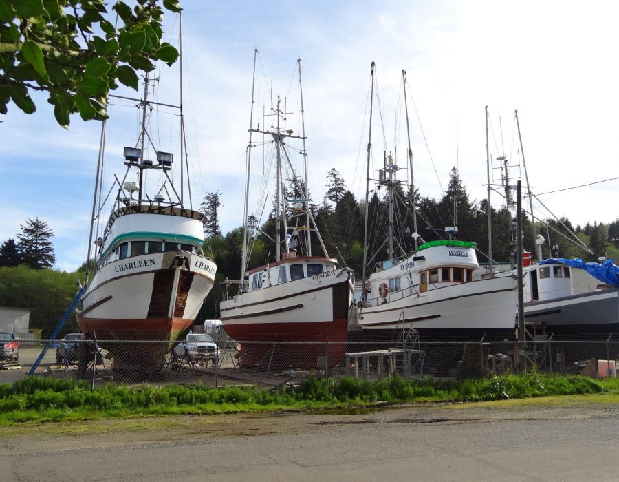 An image of pristine ships on land for storage.